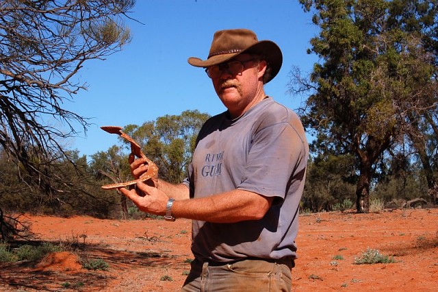 site owner showing plaster cast of the burrow of Urodacus yaschenkoi